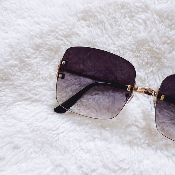 Laurel Clear Black Rimless Sleek Sunglasses - Picture 2 of 11